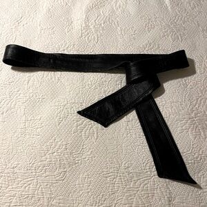 Black Italian leather wrap around belt. No size. Never worn